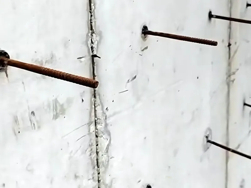 Tall, thin-walled walls experience extremely high lateral pressure, and formwork tie rods are the most effective way to resist it.